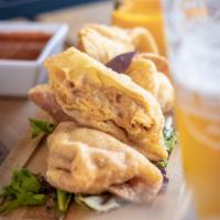 Peruvian Egg Rolls · Eggrolls stuffed with our traditional aji de gallina (shredded chicken mixed with aji amaril...