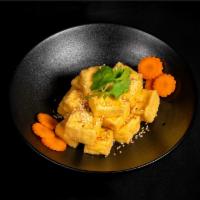 Bamboo House Crispy Tofu (VG) · Crispy tofu caramelized in house garlic vegan sauce. Vegan.