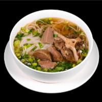 Oxtail Pho · Oxtail, eye of round steak, beef meatball.