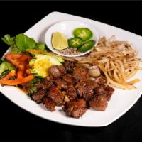 Shaking Beef Rice (Bo Luc Lac) · Cube tenderloin steak, spring mix salad, red onion and served with lime sauce.