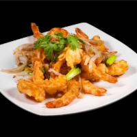 Salt and Pepper Shrimp · Lightly battered, tossed in garlic butter, onions, scallions and peppers.