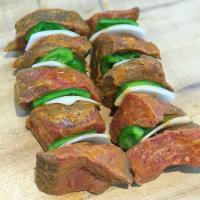 Beef Kabob · Pre-season sirloin, bell peppers and onions on a skewer.