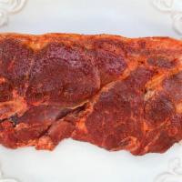 Pork Steak · Pork steaks seasoned and marinated and cut 3/4 ” 2 pork steaks per pack.