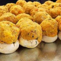 Seafood Stuffed Mushrooms · 9 per pack. Mushrooms are stuffed with our seafood stuffing and seasoned with Cajun seasonin...