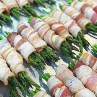 Bacon Wrapped Asparagus · 4 bundles per pack. Asparagus and cream cheese wrapped in bacon.
