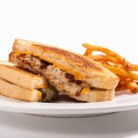 Albacore Tuna Melt · White albacore tuna and melted cheese grilled on rye bread. Served with french fries.