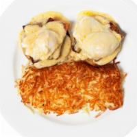 Pork Belly Eggs Benedict  · Served over an English muffin, 2 Poached eggs, and topped with chef's homemade Hollandaise s...