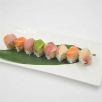 Rainbow Roll · 4 kinds of fish over crab meat and avocado. Served raw.