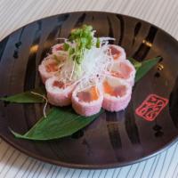 Cherry Blossom Roll · Salmon, tuna, hamachi, wrapped with soy paper. Served raw.