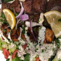 Mixed Grill Kabob Plate · Combination kabob plate with chicken, lamb and kafta. Served with basmati rice and house sal...