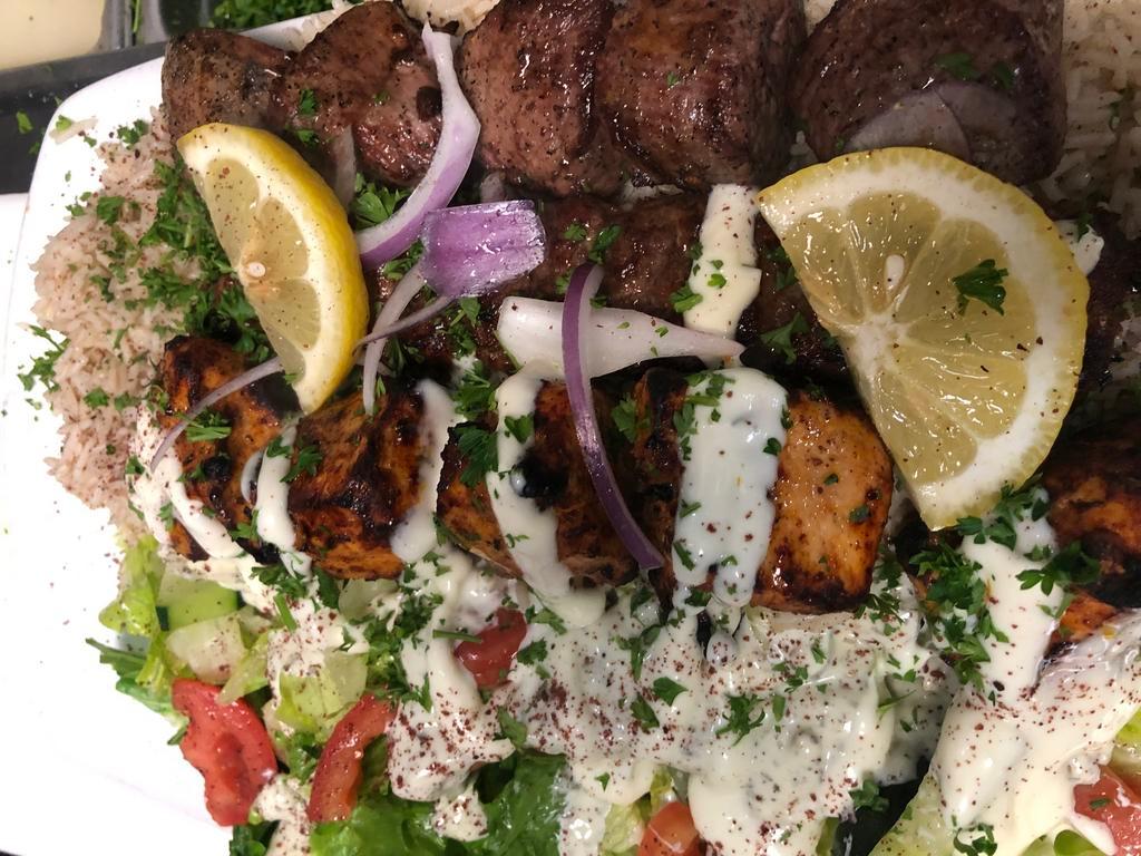 Mixed Grill Kabob Plate · Combination kabob plate with chicken, lamb and kafta. Served with basmati rice and house salad. Gluten free. Halal meat.