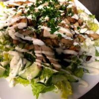 Chicken Shawarma Salad · Fresh lettuce and chicken shawarma with garlic sauce, tomato and cucumbers. Mixed with our h...