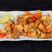 Torresmo · Deep fried pork belly w/ manioc