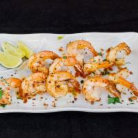 Camarao Alho e Oleo · Shrimp sautéed in garlic & lemon sauce