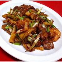 Triple Delight Special · Shrimp, sliced beef, and chicken stir-fried together white and green onions, and sauteed in ...