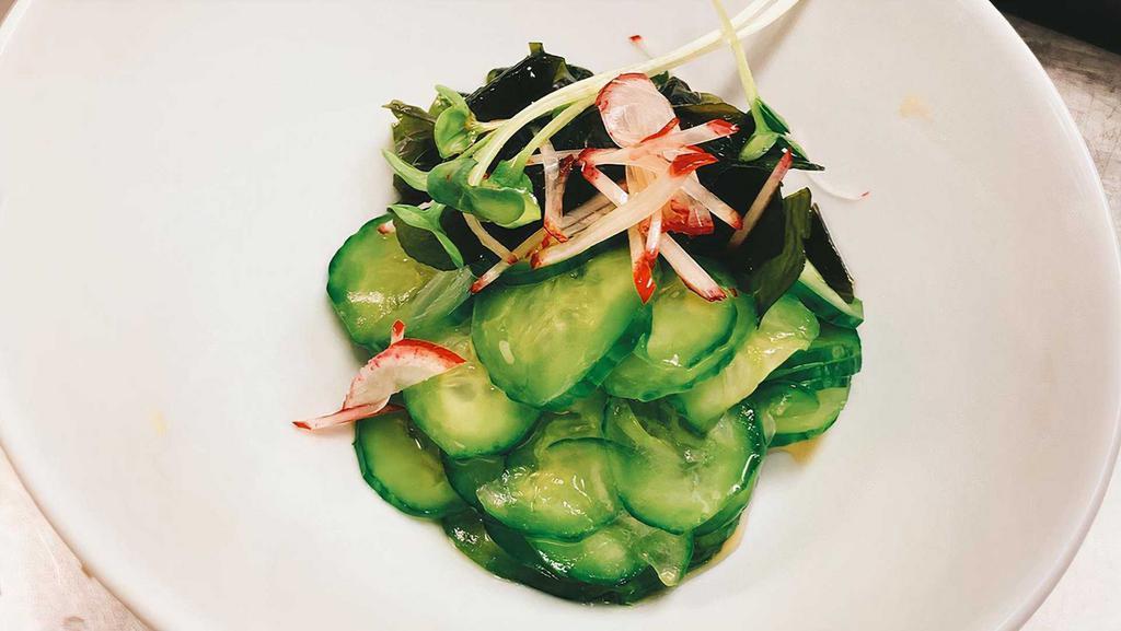 Sunomono · Sweet vinegar salad with cucumber and wakame seaweed.
