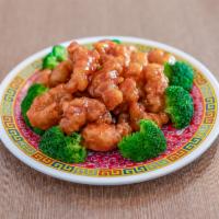 S14. General Tso's Chicken左宗鸡 · Hot the general favorite dish, crispy chunks chicken with red hot sauce on broccoli bed.