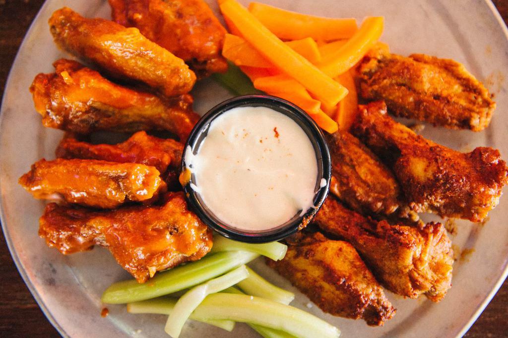 12 Wings · With 2 flavors.