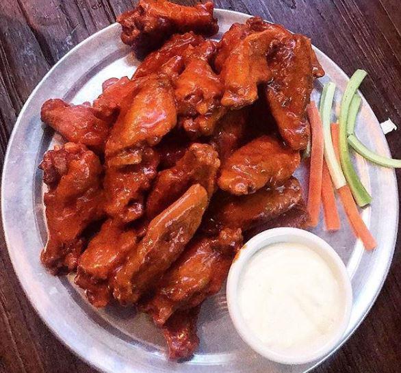24 Wings · With 2 flavors.