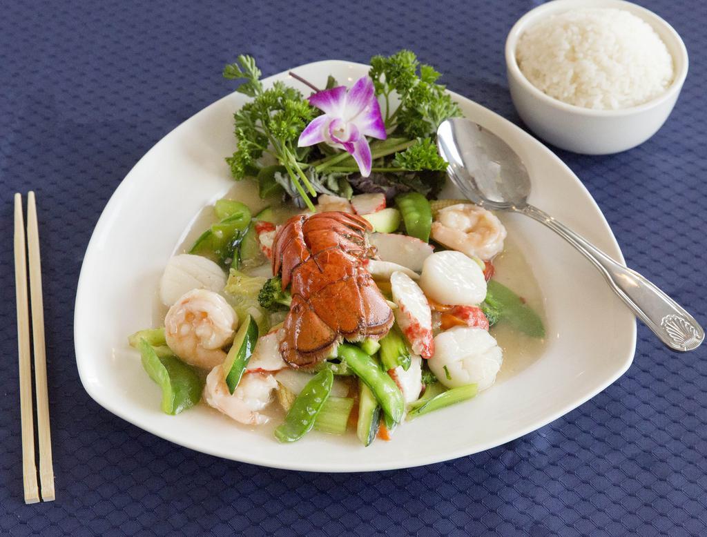 Seafood Combination · One Lobster tail, shrimps,scallops and mix veggies with white sauce 