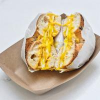 Egg Me Baby Egg Bagel · 2 fried eggs over medium and melted American cheese. 