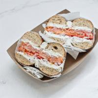 Super Nova Bagel · New York smoked Samaki salmon, caper cream cheese, red onion and tomato served on your choic...