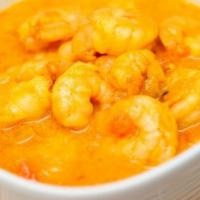 Prawn Korma · Jumbo shrimp gently simmered in coconut milk, blended with mild spiced and a creamy cashew n...