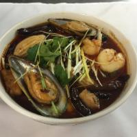 Basil Seafood · Shrimp, squid, scallops with mussels and filet of fish mixed with fresh basil, bell pepper, ...