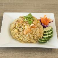 Fried Rice · Fried rice with chicken, cucumbers, peas, carrots, onions, cilantro and egg.