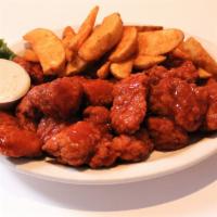 Anchor Bar Bites · True hand breaded boneless wing tossed in the sauce of your choice. If you choose a second s...