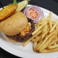 Chicken Wing Burger · 8 oz. brisket/chuck burger smothered with original Anchor Bar wing sauce, served with lettuc...