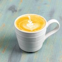 Caffe Latte · A delicious cup of  espresso with steamed milk
