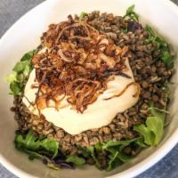 Mujadara Power Salad · Lentils and brown rice over mixed greens topped with our award-winning hummus and fried onio...