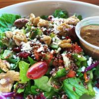 Cranberry Walnut Salad · Mixed greens, Lebanese salata, calamata olives, and quinoa tossed with Aladdin's dressing an...