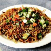 Mujadara Specialty Plate · Lentils and brown rice topped with Lebanese salata and fried onions. Vegan, nuts, gluten free.