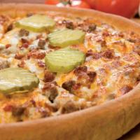 Bacon Cheeseburger Pizza · Beef, bacon bits, onions, pickles, cheddar cheese and mozzarella cheese.
