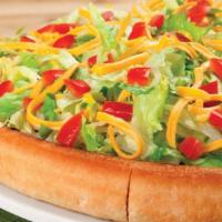 Taco Pie · Taco Sauce, Beef, Onions, Cheddar Cheese, Mozzarella Cheese, Lettuce, Tomatoes, and extra Ch...