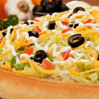 Super Specialty Taco Pie · Beef, onions, lettuce, tomatoes, taco sauce, cheddar cheese, mozzarella cheese with black ol...