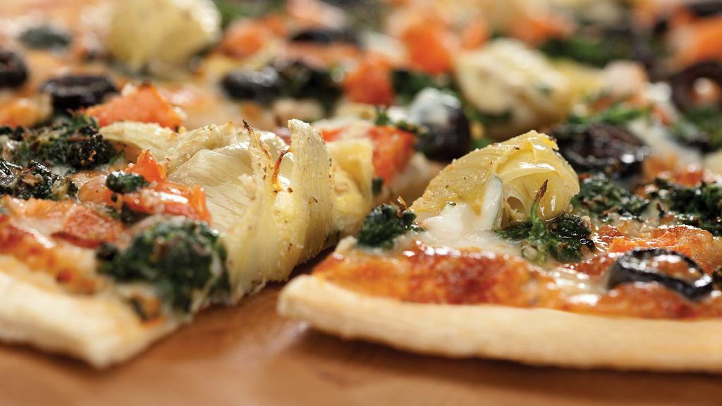 Sicilian Veggie Pizza · Spinach, artichoke hearts, marinated tomatoes, black olives, garlic and olive oil, seasoned cheese and mozzarella cheese.
Only Available in Thin Crust