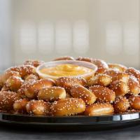 Small Rivet Party Tray · Pair your Small Size Rivets Party Tray with any 2 of our wide assortment of Pretzel Dips. Pr...