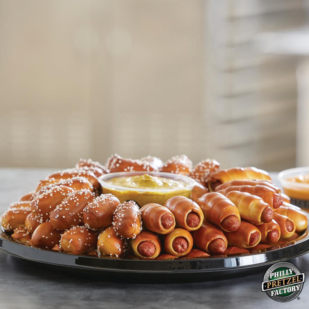 Mini Dog and Rivet Combo · A winning pair: 36 all beef mini pretzel dogs with american cheese and 64 bite-sized rivets, plus any 2 of our dips. Serves approximately 20-25 guests.