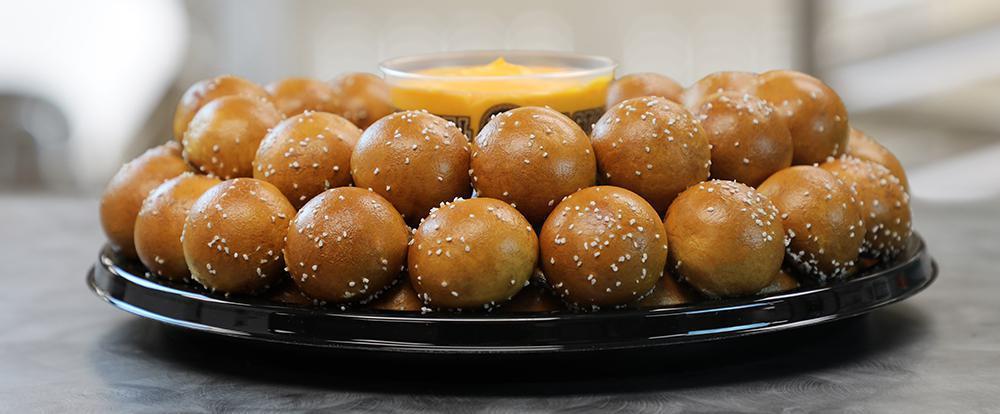 All Mini Cheesesteaks Party Tray · Pair 72 Mini Cheesesteaks with any 2 of our wide assortment of Pretzel Dips. Serves approximately 20-25 guests.
