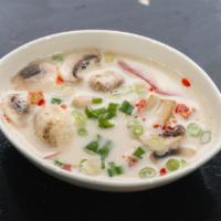 Tom Kha Soup · Coconut soup and a hint of lime juice with chicken, cilantro and galangal.
