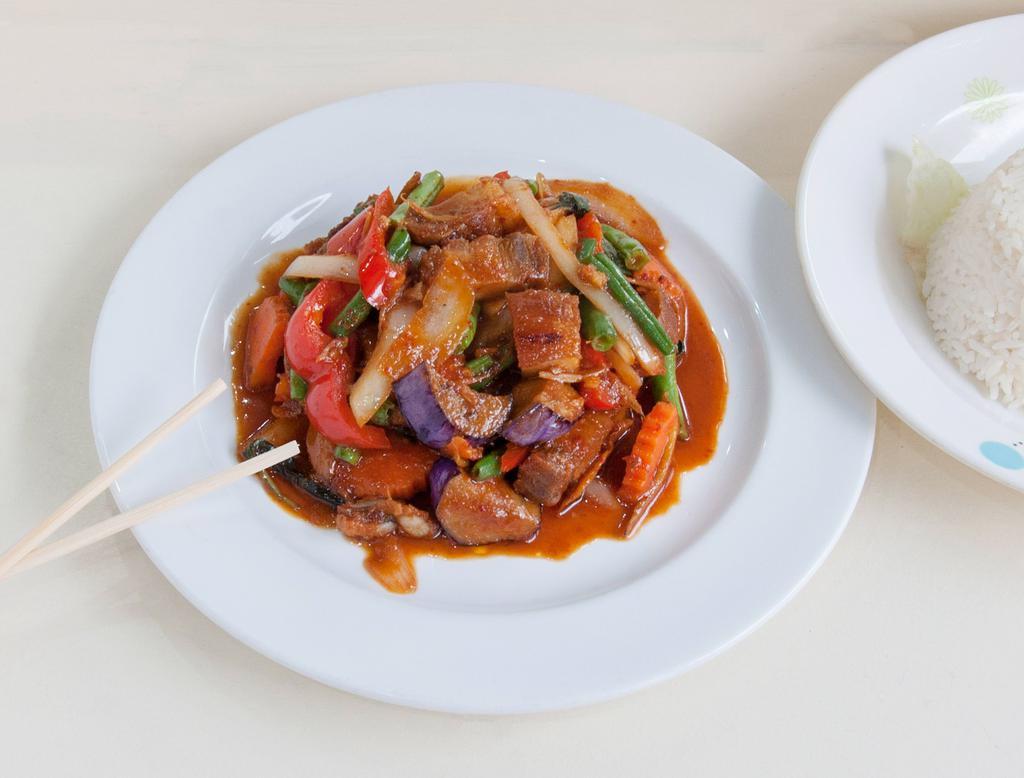 Pad Ped Crispy Pork Belly · Sauteed eggplant, bell pepper, basil and wild ginger in spicy red curry paste.