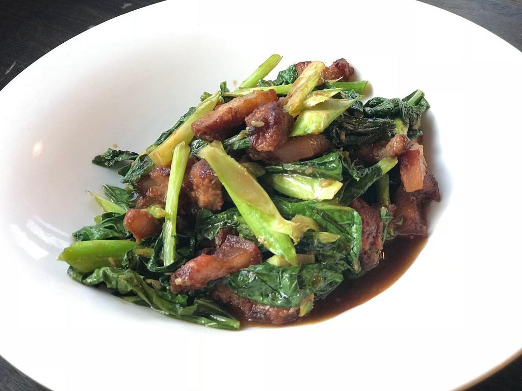 Crispy Pork Bell with Chinese Broccoli · chili and garlic sauce.Sauteed Chinese broccoli and crispy pork belly