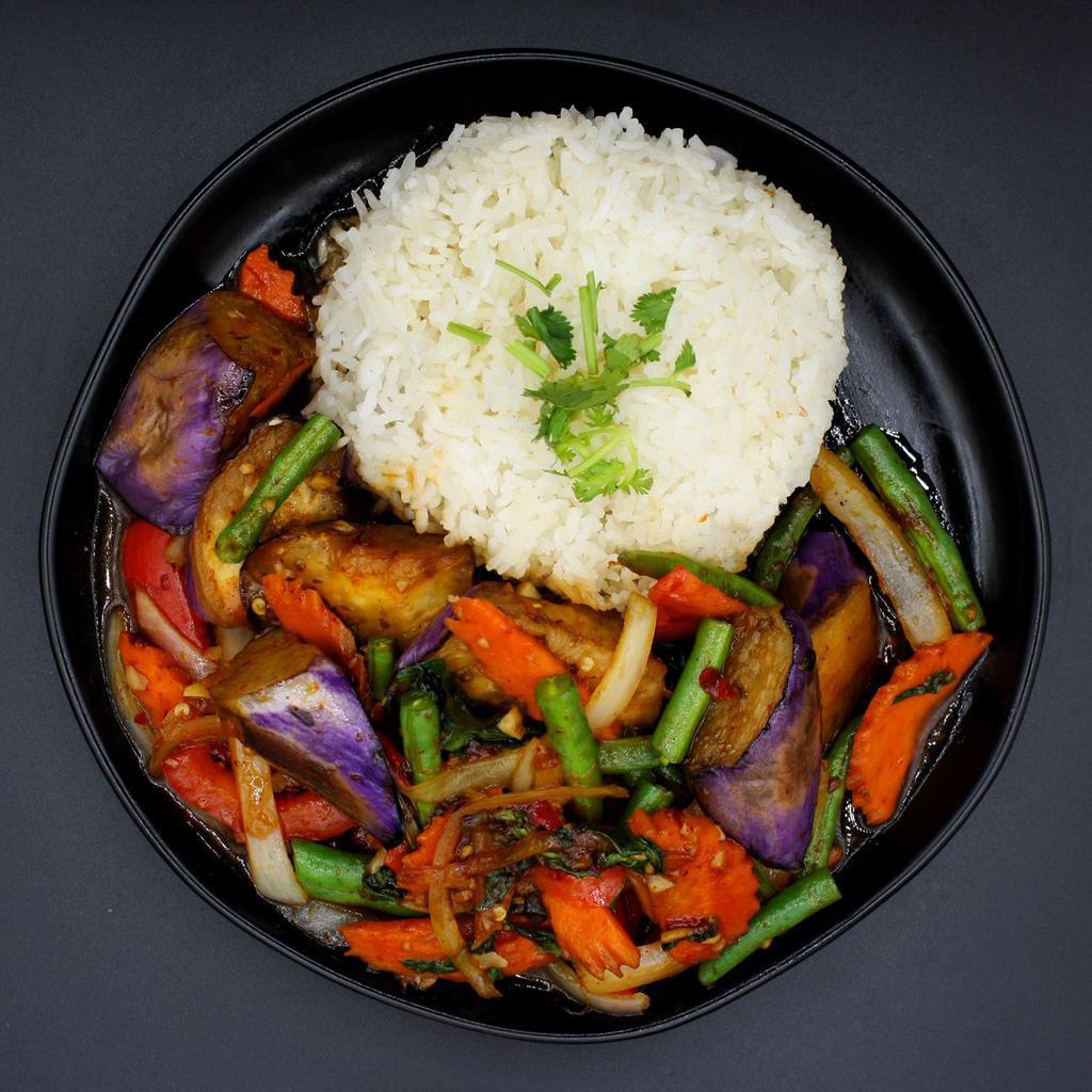 Spicy Eggplant Basil · Sauteed delicious long purple eggplant with onions, string beans, carrots and fresh basil leaves and garlic basil sauce. Vegetarian.