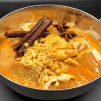 Massaman Curry · Rich and mild southern Thai curry with onions, potatoes, carrots and peanuts.