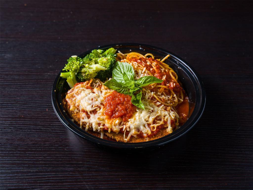 Traditional Eggplant Parmesan Dinner · Layers of breaded eggplant and our house marinara sauce topped with grande mozzarella. Served with broccoli and a side of pasta or salad.