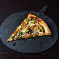 Traditional The Veggie Pizza · Mozzarella, Parmesan blend, spinach, broccoli, roasted peppers, caramelized onions, and mush...