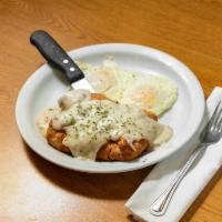 Stuffed Biscuits and Gravy · A giant fresh-baked biscuit stuffed with sausage, peppers, onions and cheese, topped with gr...